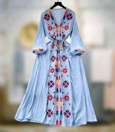 Embrace the spring-summer charm with this French sweet dress. Featuring a V-neck, delicate embroidery, drawstring waist, and a wide swing silhouette for a retro ethnic allure. One size: Length 48.4 inches (123 cm) Bust 38.6 inches (98 cm) Sleeve 18.1 inches (46 cm) Waist 34.6 inches (88 cm) **Additional Notes** - Production Variance: There may be a deviation of 0.39-1.18 inches (1-3 cm) due to different production batches. Please allow for this variability. - Size Comparison: If you are unsure a V-neck Drawstring Dresses For Spring, Bohemian V-neck Dress With Tie Waist, Spring Bohemian Maxi Dress With Drawstring, Bohemian Spring Maxi Dress With Drawstring, Spring Festival Embroidered V-neck Dress, Bohemian Maxi Dress With Drawstring For Spring, Traditional V-neck Boho Dress For Spring, Spring V-neck Maxi Dress With Multicolor Embroidery, Embroidered V-neck Bohemian Dress