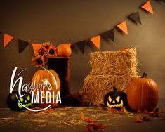 pumpkins, hay bales and bunting banner with the words maytime media on it