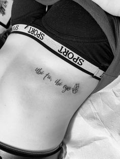 black and white photo of a woman's stomach with the words jojos written on it