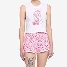 Hello Kitty Strawberry Milk Tank & Shorts Girls Lounge Set Hello Kitty Is Here To Keep You Cool And Refreshed! Relax With Sweet Style In This Adorable Lounge Set. It Includes A White Muscle Tank Featuring A Print Of Hello Kitty On Top Of A Bottle Of Strawberry Milk. The Matching Pink Shorts Feature An Allover Strawberry And Strawberry Milk Carton Print, And Come With An Elasticated Waistband For Comfort. Top: 100% Cotton Shorts: 95% Cotton; 5% Spandex Wash Cold; Dry Low Imported Listed In Junior Playful White Pajama Shorts For Loungewear, Cute Short Sleepwear For Pajama Party, Cute Short Length Sleepwear For Pajama Party, Playful White Cotton Pajama Shorts, Cute Short Sleepwear For Loungewear, Cute Cotton Short Sleepwear, Cute Cotton Sleepwear Short Length, Hello Kitty Print Tops For Summer Loungewear, Kawaii Cotton Summer Bottoms