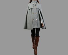 * A cool and long wool cape coat with hood, very elegant. * With double row gold color buttons and two pockets, fully lined. * If you want black or silver buttons, please let us know, thanks. * Stand up collar, more warmer. * Material: out shell - 50% wool, 50% polyester; lining - 100% polyester * Care: dry cleanable * Shop sizing chart FYI ( made according to US sizing. actual body figures, not laying flat clothes measurements) Size XS (US 2, UK 6, German 32, French 34, ) Bust: fits bust around Gray Cape For Fall Season, Gray Winter Cape, Gray Winter Cape Outerwear, Elegant Long Winter Cape, Elegant Long Coat Cape For Winter, Elegant Winter Long Coat Cape, Gray Long Sleeve Winter Cape, Elegant Fall Cape For Cold Weather, Winter Poncho With Cape Sleeves