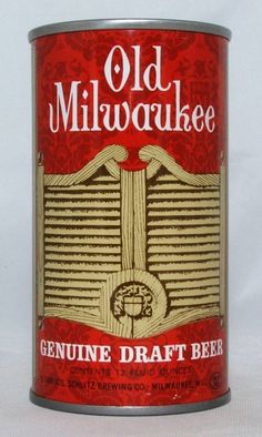 an old milwaukee beer can sitting on a table