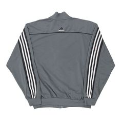 Description:Vintage grey Adidas track jacket, fits large.GENDER: mens CONDITION: good - stains on front and sleeves.STYLE: track jacketERA: 1990sCOLOUR: greyFABRIC: polyester Urban Gray Track Jacket For Streetwear, Gray Track Jacket For Streetwear In Fall, Gray Track Jacket For Fall Streetwear, Gray Sportswear Track Jacket For Fall, Gray Long Sleeve Sportswear Track Jacket, Gray Athleisure Track Jacket For Streetwear, Adidas Track Jacket, Jacket Fits, Sleeves Style