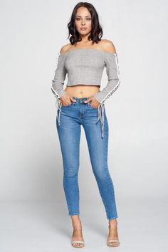 Stun in this Heather Grey/multi-tied sleeved top! Featuring sophisticate ties on the sleeves and with it's off the shoulder style, you are sure to turn heads when you pair it with some jeans and heels this season. Knit Open Shoulder Crop Top with beautiful side detail 50% Rayon/28% Polyester/22% Nylon Casual Stretch Cropped Off-shoulder Top, Stretch Cropped Off-shoulder Top For Spring, Stretch Cropped Off-shoulder Top For Fall, Spring Stretch Cropped Off-shoulder Top, Cropped Stretch Off-shoulder Top For Fall, Spring Cropped Off-shoulder Stretch Top, Tied Crop Top, Open Shoulder Top, Tie Crop Top