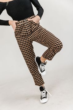 This item is not eligible for Priority Processing Make a bold statement with these Checked In Cropped Pants! With a mid-rise waist, an elastic back waist panel, and a cropped hem, these pants flatter any shape while the tan & black checkered print adds a touch of boldness. The straight-leg fit ensures these pants remain comfortable all day. Are you ready to check in? Mid-rise waist Elastic back waist panel Cropped length hem Tan & black checkered print Straight leg fit 100% Cotton XSmall - Waist: 25", Hip: 35.5", Inseam: 24" Small - Waist: 27", Hip: 37.5", Inseam: 24.5" Medium - Waist: 29", Hip: 39.5", Inseam: 24.5" Large - Waist: 31.5", Hip: 42", Inseam: 24.5" XLarge - Waist: 36.5", Hip: 46.5", Inseam: 24.5" 2XLarge - Waist: 42", Hip: 51.5", Inseam: 24.5" 3XLarge - Waist: 46", Hip: 56", I Checkered Pants Outfit, Early Fall Fashion, Netflix Chill, Yoga Hoodie, Gingham Pants, Checkered Pants, Alt Outfits, Black Checkered, Checkered Print