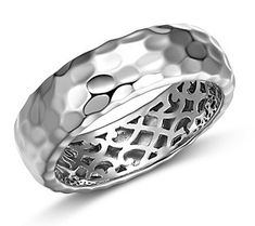 Multi-dimensional style is yours with this gorgeous sterling silver band. It features a hammered texture on the outside and hidden, ornate filigree on the inside. From Silver Style. Elegant Hammered Wide Band Ring, Elegant Hammered Wide Ring For Promise, Silver Hammered Wide Band Ring For Wedding, Elegant Sterling Silver Hammered Wide Band Ring, Elegant Hammered Wide Band Ring In Sterling Silver, Elegant Silver Wide Band Ring With Diamond Cut, Elegant Silver Engraved Wide Band Ring, Elegant Engraved Silver Wide Band Ring, Hammered Band