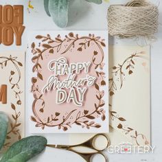 a card with the words happy mother's day on it next to some crafting supplies