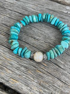 "Sometimes a simple statement is all that's needed. Or a complimentary addition to your stack will look fabulous. This turquoise rondel nugget bracelet is just that. With a simple Edison baroque pearl between dotted pewter beads and beautiful Mexican turquoise rondel style nuggets. 2 available, 1 measures 7.5\", the other is 8\". Choose from the drop-down menu the size you need. You can find more stretch bracelets shown in a couple of photos in other listings.  BRACELET SIZING🧡 To measure wrist Everyday Hand-strung Turquoise Stretch Bracelet, Everyday Turquoise Hand-strung Stretch Bracelet, Everyday Turquoise Stackable Stretch Bracelet, Everyday Bohemian Turquoise Stretch Bracelet, Spiritual Stackable Turquoise Stretch Bracelet, Turquoise Stretch Bracelet With Natural Stones, Turquoise Natural Stones Stretch Bracelet, Turquoise Stretch Bracelet With Round Beads, Turquoise Stretch Bracelet With Stackable Round Beads