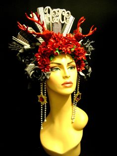 "Christmas headdress, it is made in strong but light Eva foam, all handmade, decorate with paint, glitter, decorative rhinestones, flowers, Christmas ornaments, rhinestones trims and icicles. The headdress is lining with felt and have adjustable elastic on the back. Fit between 22\" and 24\" Any question let me know! Thank you" Whimsical Crown Costume Hat For Carnival, Red Tall Crown Costume Hat For Party, Whimsical Tall Crown Headpiece For Carnival, Whimsical Headpieces For Festivals And Parties, Whimsical Festival Headpieces For Parties, Whimsical Festival Party Headpieces, Whimsical Red Headband Style Headpiece, Red Whimsical Headband Style Headpiece, Whimsical Costume Hats With Handmade Flowers For Party