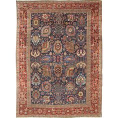 an antique persian rug with various colors and patterns