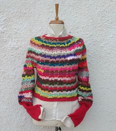 Colorful Knitted Crew Neck Sweater, Multicolor Knit Winter Top, Colorful Knit Sweater For Winter, Multicolor Knit Pattern For Winter, Multicolor Acrylic Sweater, Multicolor Knitted Acrylic Tops, Multicolor Long Sleeve Christmas Sweater, Festival Long Sleeve Multicolor Sweater, Red Bohemian Knit Sweater