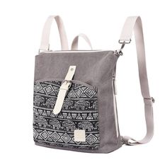 Aretha Canvas Backpack is an incredible bag thanks to its removable and adjustable straps. It can be transformed from a backpack to a crossbody bag in a fraction of a second. Its bohemian design on the front pocket makes it also fabulous. This charming style complements any outfit. The Aretha Canvas Backpack has a large storage capacity. Its large main compartment can hold a 13-inch laptop, tablet, and other daily essentials. The Aretha Canvas Backpack also has a large front pocket and two large Trendy Gray Backpack Shoulder Bag, Gray Backpack Shoulder Bag, Gray Shoulder Backpack With Adjustable Strap, Bohemian Backpack With Adjustable Strap For Travel, Bohemian Everyday Backpack With Adjustable Strap, Gray Satchel With Adjustable Strap For On-the-go, Trendy Backpack Shoulder Bag With Adjustable Straps, Bohemian Tote Backpack For Daily Use, Gray Travel Backpack Shoulder Bag