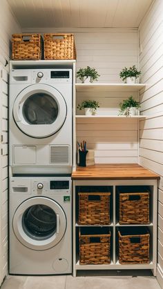 a washer and dryer sitting next to each other in a room with white walls