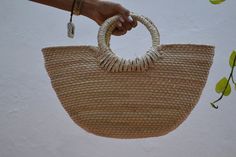 FREE SHIPPING IN USA Handmade bag with palm leaves. Perfect summer bag: for the beach, a picnic in the park or to wear your favorite outfit ... very versatile, with all the summer style. This bag is handwoven in Mexico from sustainable palm leaves decorated with unique applications. Materials: palm leaves. Please note that these bags are handmade, shapes and sizes may vary slightly. Summer Jute Bag With Round Handle, Straw Shoulder Bag With Round Handle For Beach, Eco-friendly Beige Beach Bag With Round Handle, Eco-friendly Handheld Shoulder Bag For Beach, Casual Crochet Bag With Round Handle, Casual Crochet Bag With Round Handle In Natural Color, Beach Shoulder Bag With Bamboo Round Handle, Vacation Bags With Round Handle In Jute, Vacation Jute Bag With Round Handle