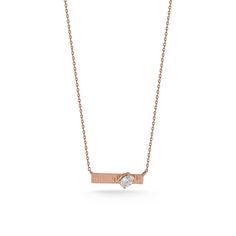 The Teddi Paige Fluted Oval Bar Necklace is the epitome of refined elegance, elevating the classic bar necklace to new heights. Crafted with a unique fluted texture in 14k gold, the necklace showcases fine ridges that catch the light beautifully, adding depth and dimension to the design. At its center, a brilliantly angled oval diamond enhances the piece's allure, offering a subtle yet striking contrast against the textured gold - making it a one-of-a-kind piece that will be a cherished favorite Elegant 14k Gold Bar Necklace, Elegant 14k Gold Bar Necklace For Formal Occasions, Elegant Bar Necklace With Delicate Chain For Formal Occasions, Elegant Delicate Chain Bar Necklace For Formal Occasions, Elegant Delicate Chain Bar Necklace For Formal Events, Elegant Polished Rectangular Pendant Necklace, Elegant Necklace With Rectangular Pendant And Polished Finish, Elegant Necklace With Polished Rectangular Pendant, Elegant Rectangular Pendant Necklace With Polished Finish