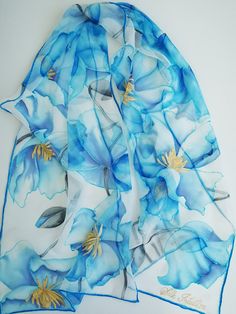 Hand painted Alluring Silk Chiffon scarf-Himalayan Blue Poppies . Lots of gorgeous sky blue flowers, and grayish blue buds composed all length long on white lightest silk chiffon. This design Scarf is MADE TO ORDER and available in 2 SQUARE and 5 OBLONG sizes: 21*x21 inches (55x55cm)- Very small square. Can serve as a kerchief; wrist, head or bag band. 35*35 inches (90*90cm) -Possible various combinations of twisting on neck/chest. XS---59x15 inches (150x40 cm)- quite Small scarf. SHOWN ON ALL P Elegant Hand Painted Blue Scarves, Elegant Blue Hand Painted Scarves, Blue Spring Wedding Dupatta, Blue Dupatta For Spring Wedding, Blue Wedding Dupatta For Spring, Blue Floral Print Silk Scarf As Gift, Blue Floral Print Silk Scarf For Gift, Blue Silk Scarf For Wedding, Bohemian Blue Dupatta For Spring