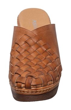 A rounded toe and woven design make this clog a perfectly poised option for any occasion. 3" heel; 1" platform Leather upper and lining/rubber sole Imported Woven Design, Womens Clogs, Tan Leather, Nordstrom Rack, Clogs, Rubber Sole, Leather Upper, Nordstrom, Heels