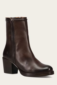 The hallmark of these ankle boots is the vintage pull-up leather's softness and sheen. Their unique character is intensified by the heritage, raised stitching, and strong heel, while the round toe, leather lining, and side zipper provide comfort and conve Brown Combat Boot Outfits, Cute Winter Shoes, Fall Ankle Boots, Combat Boot Outfits, Short Brown Boots, Boots Fall Ankle, Brown Combat Boots, Nice Pants, Brown Heeled Boots