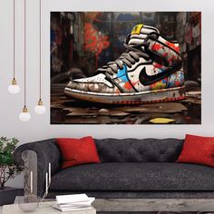 a living room with a couch and a painting on the wall above it that says nike