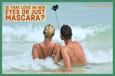 two people in the water with a camera attached to their backs, and an advertisement for eyewear