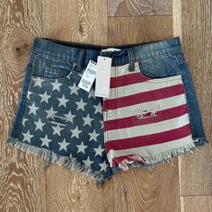 *Brand New* With Tags, “Others Follow” American Jean Shorts From Tilly’s. They Are A Size 26. Frayed Hem With Stars & Stripes Design On Front. Perfect For 4th Of July! Zipper And Button Closure. Waist Measures Approximately 14” From Side To Side. Measurement From Top Of Waist To Hem Is Approximately 10.5”. Comes From A Smoke Free Home. Retail Is $39.99 Orange Jeans, Usa Shorts, Camouflage Shorts, Retro Jeans, American Jeans, American Flag Print, Star Jeans, Cut Off Jeans, Faded Denim