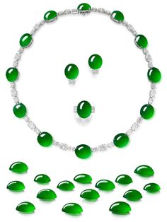 Comprising: a necklace, composed of twelve highly translucent oval jadeite cabochons of intense emerald green colour, decorated with oval diamonds; and a pair of earrings and ring en suite, set with three oval jadeite cabochons of same quality; all fifteen cabochons weighing 180.20 carats in total; all mounted in 18 karat white gold, necklace length approximately 400mm, earrings with post and butterfly fittings, ring size 6. Diamond Parure, Imperial Jade, Stone Jewellery, Necklace Length