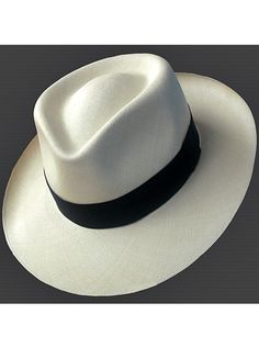 Brand: Gamboa PremiumColor: Natural Material: Toquilla Straw Brim: 7.5 cm (3")Grade: 17-18 (Fine Fine)learn more Sweatband: Cotton Twill, 3 cm. (1.18") Crown: 11 cm. (4.3") Ribbon: Leather band Description: A luxurious hat, handmade in Montecristi, the worldwide famous Panama Hat town in Ecuador. This Panama Plantation (Ausin) hat for men is a top quality, classic and elegant hat. Each hat is individually blocked and trimmed to meet the highest quality standards.Each Gamboa Premium Hat is presen Cuban Hat, Poncho Mexican, Panama Hat Men, Elegant Hat, Poncho Pullover, Alpaca Socks, Alpaca Scarf, Elegant Hats, Hat Handmade