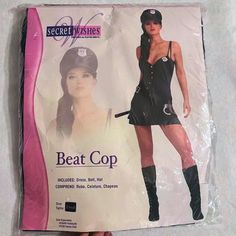 a woman in a black dress and hat is holding a pink toothbrush with the caption beat cop on it