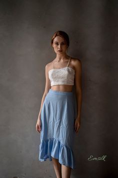 "This design linen set is perfect for summer and fall! 100 % designed and handmade by Emsilk. I am pleased to offer your garments made to measure at no extra cost. * Detail: - This set includes: 1 linen midi skirt with ruffles hem, 1 lace short crop top - Sweetheart lace under top with invisible zip on the back. - Gather on hem Midi skirt - Fully lined - Invisible zipper on the back - High quality linen, washed linen, soft linen - The model is 5'8\" tall and wearing size S. * Care: - Dry clean o Flowy Ruffle Midi Dress, Summer Lace Maxi Skirt With Ruffles, Lace Ruffled Maxi Skirt For Summer, Summer Lace Maxi Skirt With Ruffled Detail, Breezy Ruffled Maxi Skirt, Summer Lace Lined Maxi Skirt, Lace Lined Summer Maxi Skirt, Summer Lace Long Maxi Skirt, Chic Lace Maxi Skirt For Summer