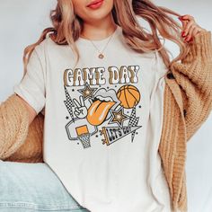 Game Day Basketball Collage Tee - Limeberry Designs Basketball Cheer Shirts Designs, Cheap White School Spirit Shirt, Trendy Vinyl Shirt Ideas, Sports Fan Tops With Team Logo For Game Day, Soccer Spirit Wear, Collage Shirt Design, Collegiate Graphic Print T-shirt For Game Day, Sports Fan T-shirt With Letter Print For Game Day, Basketball Spirit Shirts