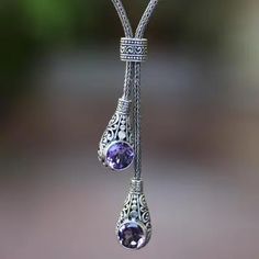 Faceted Amethyst Lariat Necklace from Bali - Tears of a Goddess | NOVICA Adjustable Silver Lariat Necklace With Gemstone, Silver Artisan Lariat Necklace For Gift, Artisan Silver Lariat Necklace For Gift, Silver Gemstone Lariat Necklace As Gift, Sterling Silver Lariat Necklace With Gemstone, Silver Gemstone Lariat Necklace In Sterling Silver, Elegant Silver Lariat Necklace With Natural Stones, Elegant Silver Drop Necklace With Natural Stones, Bohemian Amethyst Jewelry With Intricate Design