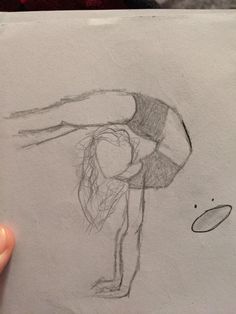 a drawing of a person doing a handstand on a piece of white paper