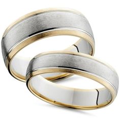 two tone gold and silver wedding rings with matching bands on each side, set against a white background