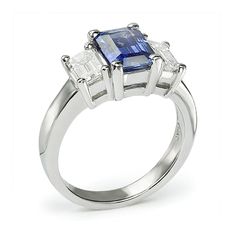 This amazing three stone engagement ring has a spectacular Emerald Cut Blue Sapphire at its center. This gemstone is an emerald step cut sapphire with a 1.54 ct. weight and its signature blue color. It is coupled with a pair of emerald cut diamond side stones both with precisely matched G color and immaculately eye clean VS-1 natural clarity. They are set into this platinum ring we can make in any finger size. Luxury Three Stone Emerald Cut Sapphire Ring, Luxury Three-stone Emerald-cut Sapphire Ring, Lab-created Sapphire Three Stone Emerald Cut Rings, Fine Jewelry Three Stone Baguette Cut Sapphire Ring, Emerald Cut Sapphire And Diamond Three Stone Ring, Emerald Cut Sapphire Three Stone Jewelry, Emerald Cut Three Stone Sapphire Ring, Emerald Cut Sapphire Ring With Three Stones, Classic Three-stone Sapphire Ring With Baguette Cut