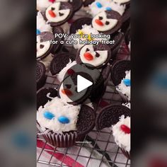 cupcakes with frosting and decorations are arranged on a cooling rack, which reads pov you're looking for a cute birthday treat