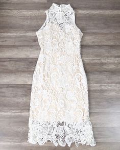 Loves Divine Midi Dress Polyester lace midi dress High neck Keyhole back Button closure on neck Beige lining Split at back This midi dress is so stunning in the white lace. With the high neck and open back, it’s classy yet sexy – the perfect party dress. Wear it with heels and a red lip – what’s not to love? SKU: L088- Dress High Neck, Red Lip, Lace Midi, Polyester Dress, Lace Midi Dress, White Midi Dress, Lace Overlay, Perfect Party, Red Lips