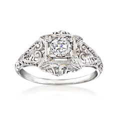 Ross-Simons - C. 1980 Vintage .35ct Diamond Filigree Ring Round Cut in 18kt White Gold. Size 7. C. 1980. Mark your engagement with a romantic vintage treasure! Brimming with filigree openwork, our elegant Estate collection ring boasts a beautiful .35 carat round brilliant-cut diamond in polished 18kt white gold. 3/8" wide. Diamond ring. Exclusive, one-of-a-kind Estate Jewelry. Diamond birthstones are the perfect gift for April birthdays. Diamond Birthstone, Fine Jewelery, Filigree Ring, Jewelry Diamond, Vintage Diamond, Jewelry Rings Engagement, Round Brilliant Cut Diamond, Estate Jewelry, Round Brilliant