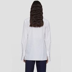 Discover Elegance and Comfort Step into the world of refined fashion with our Asymmetric Cotton Blouse, a perfect blend of style and comfort. Designed for the modern woman, this blouse is a versatile piece that elevates your wardrobe with its understated elegance. Whether you're heading to the office or enjoying a casual day out, this blouse is your go-to choice for a chic, put-together look. Product Features Our blouse boasts a unique asymmetric lapel and a side single-breasted design that adds a contemporary twist to the classic blouse. The solid color pattern, available in timeless white and black, ensures it pairs effortlessly with any outfit. Crafted from a blend of high-quality cotton and polyester, the blouse offers both durability and comfort. Its loose fit design provides a relaxe Luxury Button, Refined Fashion, Classic Blouses, Unique Blouse, Clothing Catalog, Blouse For Women, Stylish Shirt, High Rise Pants, Midi Skirts