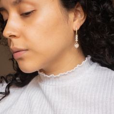 Handcrafted out of wire, faux pearls and cubic zirconia heart shaped charms! And also modeled by me :-) #handmadeearrings #daintyearrings #earringsociety #minimalistearrings #earringsoftheday #cutejewelry #pearlearrings #handmadebusiness #luxuryearrings #studdedearrings #goldjewelry #charmearrings #trendyearrings #springjewelry #modernjewelry #fashionfinds #handmadefashion #jewelryinspo #jewelryinspiration Heart-shaped Sparkling Earrings For Wedding, Rose Gold Pearl Earrings With Cubic Zirconia, Rose Gold Cubic Zirconia Pearl Earrings, Elegant Heart-shaped Diamond Earrings For Wedding, Elegant Heart Shaped Diamond Earrings For Wedding, Heart-shaped Crystal Earrings For Wedding, Heart-shaped Cubic Zirconia Crystal Earrings For Wedding, Cubic Zirconia Drop Earrings With Sparkling Stones, Wedding Heart Drop Earrings Single Piece