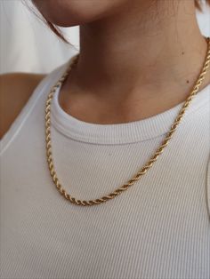 Our 18k Gold Filled Rope Chain Necklace is the perfect layering piece to accentuate any style. This lightweight rope chain pairs beautifully with other chain necklaces or pendants--We love it with our Anabella Necklace. This essential necklace is a must-have for every fashion lover! Details 18k Gold Filled 18in 20in, 22in in Length 2.5mm width model wearing 20in Tarnish-resistant, water-resistant, and safe for sensitive skin Minimalist Everyday Rope Chain Jewelry, Everyday Minimalist Rope Chain Jewelry, Classic Rope Chain Necklaces As Gift, Classic Rope Chain Necklaces For Gifts, Classic Everyday Rope Chain Jewelry, Dainty Everyday Rope Chain Jewelry, Rope Chain Link Necklace As Gift, Minimalist Yellow Gold Rope Chain Necklace For Everyday, Everyday Minimalist Rope Chain Necklace