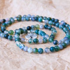 108 Mala Buddhist Prayer Bead Mala Jewelry Mantra by MishkaSamuel Mala Jewelry, Buddhist Prayer, Prayer Beads, Moss Agate, Jewelry Bags, Mantra, Fashion Watches, Agate, Jewelry Accessories