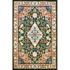 a green rug with an ornate design on the bottom and sides, in various colors