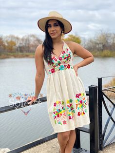 This Beautiful Halter Dress is the perfect combination of style and Mexican Culture. It's made out of cotton, has ties around the neck and has elastic on the back for a tighter fit. It is hand embroidered with beautiful flowers. This dress is handmade with love by Mexican Artisans in Chiapas, Mexico. Please Note: Since this dress is Hand embroidered the embroidered colors on each dress vary, making each one of a kind. There are more colors available here: https://www.etsy.com/es/listing/72078704 Fiesta Cotton Dress With Floral Embroidery, Mexican Party Dress, Mexican Bridesmaid Dresses, Traditional Embroidered Fiesta Dresses, Sunflower Mexican Dress, Traditional Sleeveless Embroidered Fiesta Dress, Traditional Cotton Embroidered Fiesta Dress, Fiesta Dress, Floral Halter Dress