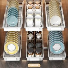 an organized dish rack with dishes in it