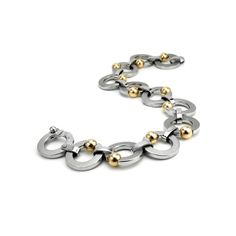 "Brushed and polished round flat ring links bracelet with with Tension Set gold spheres. Abbracci Collection Links diameters: 15mm - 5/8 Spheres sizes: 5mm - 3/16\" The Clasp has the same link design, it snaps very comfortably. This item is specifically crafted for you - will ship in 1 to 2 weeks - Free USA Shipping NEWS! An exclusive Special Orders Service is now available to make dreams a reality: a Taormina creation designed to order is produced exactly as requested. Whether it's one of our original design or a new twist to an existing model, each piece is conceived during email conversation between the client and our Team." Modern Yellow Gold Bracelets With Round Beads, Modern Link Bracelets With Polished Finish, Modern Yellow Gold Oyster Chain Bracelet, Contemporary Metal Bracelets For Formal Occasions, Modern Tarnish Resistant White Gold Bracelet, Timeless Metal Bracelets With Oval Links, Timeless Metal Bracelet With Oval Links, Formal Metal Bracelets With Round Beads, Modern Round Chain Bracelet With Polished Finish