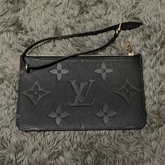 Louis Vuitton Black Leather Monogram Empreinte Pouch / Wristlet Only. Brand New, Never Used. Purchased In Italy - It Came With My Neverfull Mm. I Have The Receipts As Well! This Is A Limited Edition And It’s Out Of Stock. Louis Vuitton Wristlet, Leather Monogram, Louis Vuitton Black, Neverfull Mm, Clothes Women, Fashion Clothes, Louis Vuitton Monogram, Louis Vuitton Bag, Fashion Clothes Women