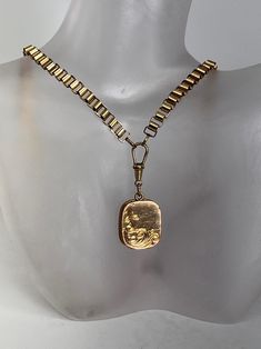 Beautiful and Rare example of a rose gold filled Book Link Chain and Locket necklace. The locket measures 22x18x5mm and the chain is 19" long with a 5.5mm width of the links. The whole necklace weighs 1.1oz Rose Gold Pendant Locket Necklace With Adjustable Chain, Vintage Yellow Gold Necklace With Rectangular Pendant, Bronze Link Jewelry As A Gift, Antique Engraved Rose Gold Necklace, Antique Gold Necklace With Rectangular Pendant, Rose Gold Locket Necklace For Formal Occasions, Formal Rose Gold Locket Pendant Necklace, Formal Rose Gold Engraved Locket Necklace, Formal Rose Gold Locket Necklace