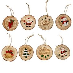 christmas ornaments are hanging on wood slices