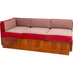 a wooden couch with red cushions on it's back and side panels, against a white background