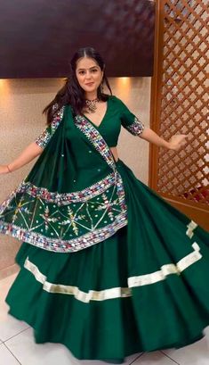 Instagram$Facebook Follow Us :- @jayamarfab Green Silk Lengha Choli Indian Navaratri Lehenga Choli Designer Lehenga We Make Wedding Lehengas, Indian Lehenga, Bridal Lehenga, Designer Lehenga, South Indian Dresses, Lengha Choli, Chaniya Choli, Lancha, Semistitched Lehenga, Bridesmaid Lehengas, Sabyasachi Lehengas, Floral Skirts, Punjabi Lehengas, Ethnic Lehengas, Indo-western Outfits, Indian Outfits, Bollywood Lehengas. Importance note: we will not make any changes in lehenga length 𝗟𝗲𝗵𝗲𝗻𝗴𝗮 𝗖𝗵𝗼𝗹𝗶 𝗗𝗲𝘁𝗮𝗶𝗹𝘀 :- Lehenga :- Lehenga Fabric :- Malay Silk Material And Big Canvas Belt. Lehenga Flair :3.70mtr Lehenga Inner : Cotton Lehenga Length: 40-41 Inches Dupatta :- Fabric : Heavy Faux Georgette Material With 9mm Sequence Work Multi Colored Embroidery Work. Blouse :- Blouse Fab Green Sets With Mirror Work For Navratri, Green Navratri Sets With Mirror Work, Semi-stitched Green Bohemian Lehenga, Belt Lehenga, Choli Blouse Design, Chaniya Choli Designs, Ghaghra Choli, Navratri Dress, Cotton Lehenga